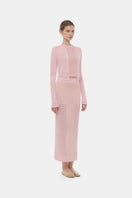 Pink long-sleeves top by Montsand, soft fabric with a relaxed fit, shown on a mannequin with folded sleeves and a simple style.