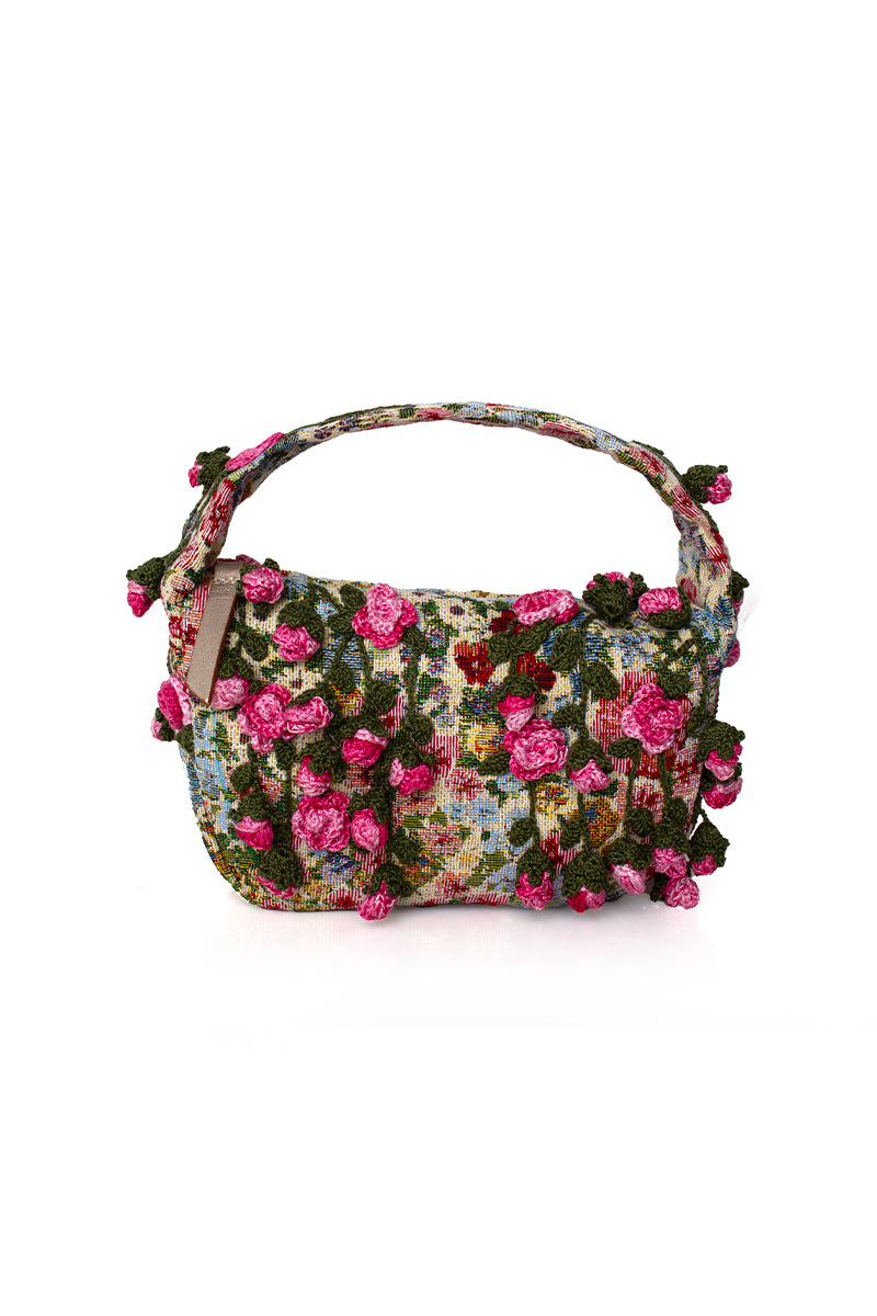 Pink top handle bag by Sarah's Bag featuring pink roses embroidery on Le Petit style, stylish and elegant accessory.