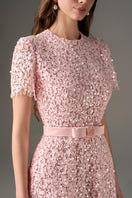 Pink sequined floral lace midi dress by I.H.F Studio featuring structured design and sculpted hips for an elegant look.
