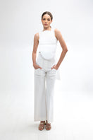 Light ivory Pino pants by ANA + MARIA, featuring a tailored fit and soft fabric, displayed on a neutral background.