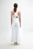 Light ivory Pino pants by ANA + MARIA displayed on a mannequin, showcasing their relaxed fit and stylish design.