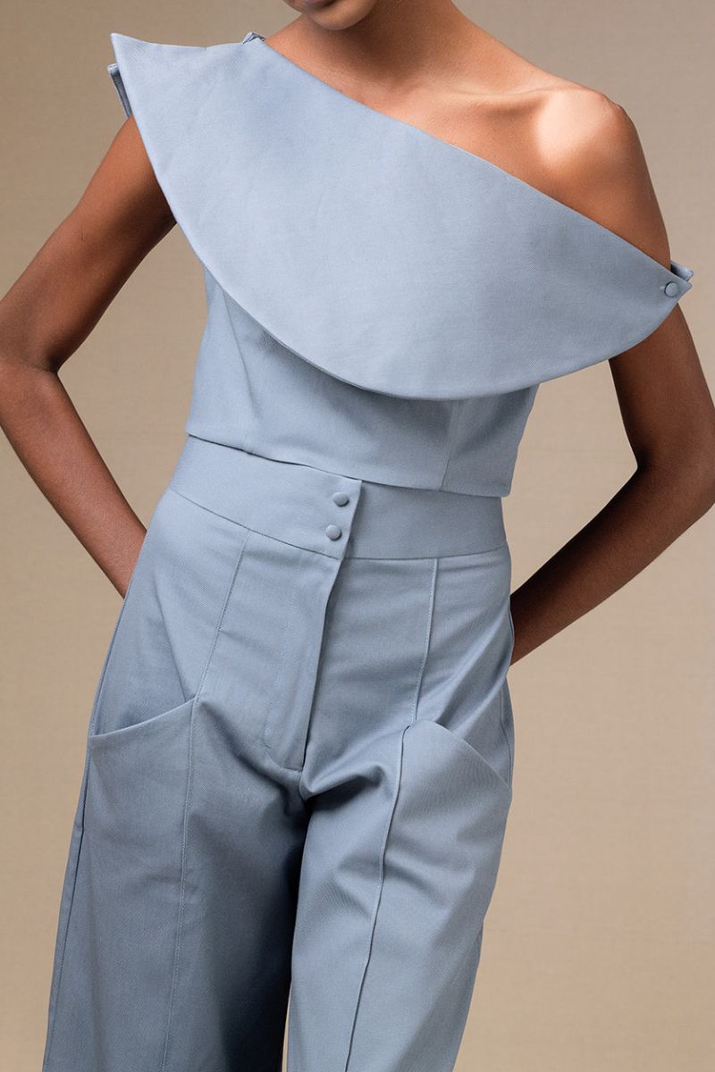 ANA + MARIA Pino pants in Tempest color, showing a stylish pair of tailored pants with a relaxed fit and subtle design details.