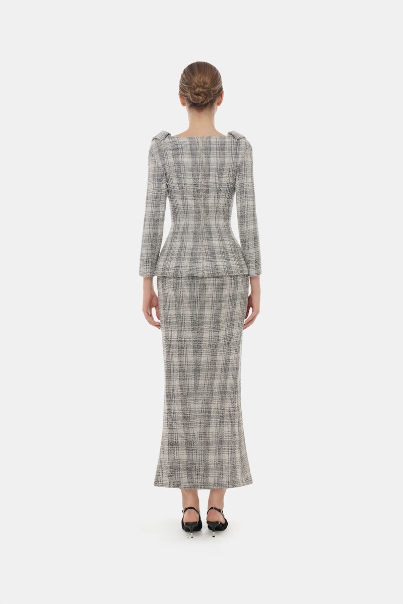 Montsand plaid tweed V-neck peplum blazer top displayed with a matching plaid tweed midi skirt.
