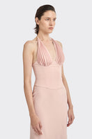 Dusty pink MS. Pleat Corset Midi Dress by Stolen Stores, featuring elegant pleats and a fitted corset style for chic occasion wear.