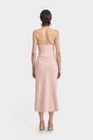 Dusty pink MS. Pleat Corset Midi Dress by Stolen Stores, featuring pleated fabric and a fitted corset style.