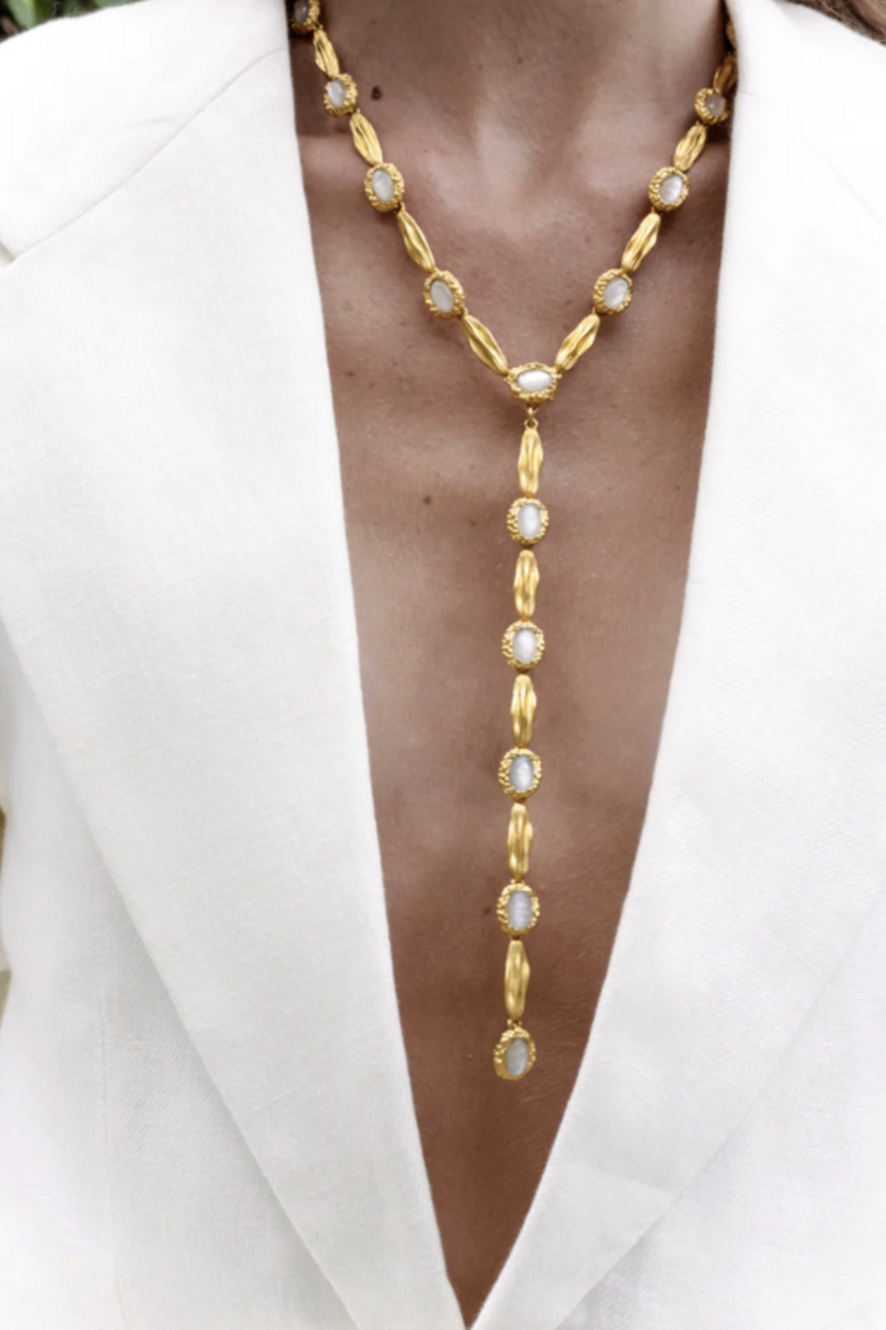 Gold Poise Necklace by Jude Benhalim featuring a sleek, elegant design on a white background.