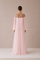 Light pink Pollen dress by Nihan Peker, elegant gown with flowing fabric and delicate design, perfect for formal occasions.