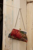 Multicolor clutch bag with pomegranate and autumn field design by Sarah's Bag, featuring a classic style and intricate detail.