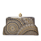 Sarah's Bag clutch featuring a pomegranate design on sunburst brocade fabric with metallic accents, elegant evening accessory.