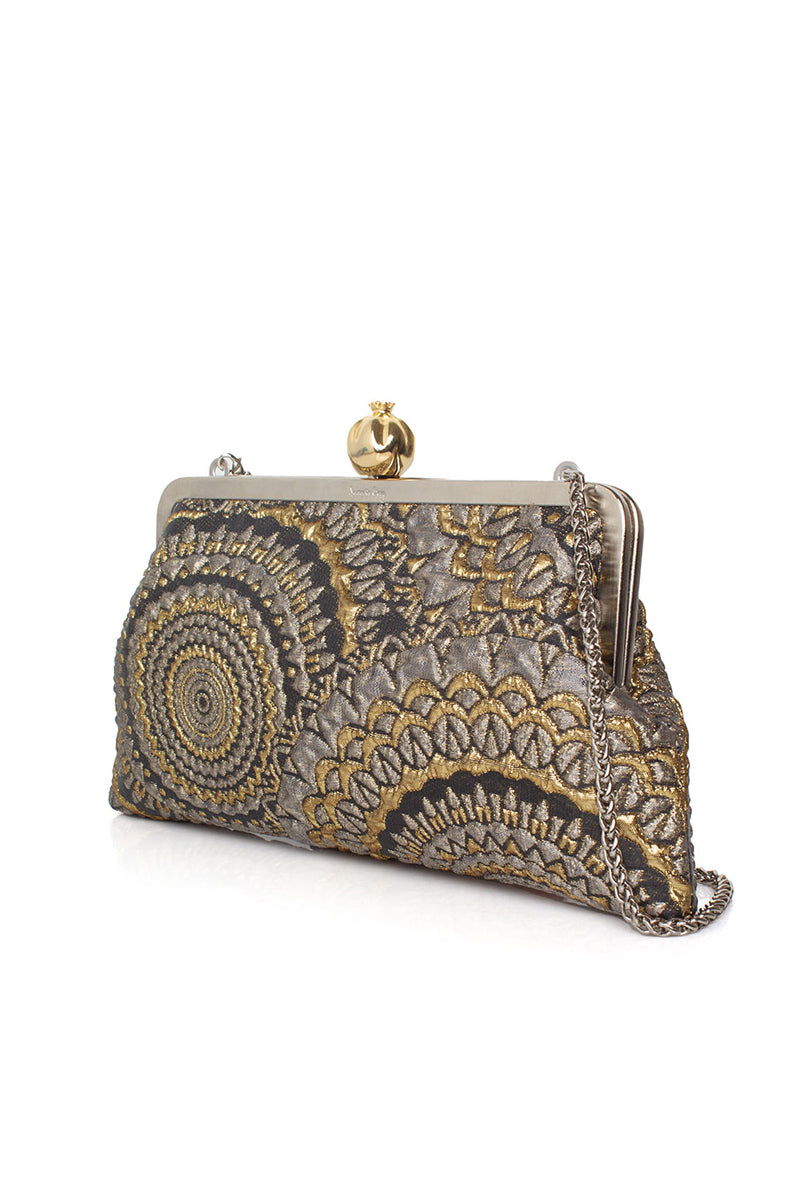 Elegant clutch bag with pomegranate embroidery on sunburst brocade fabric by Sarah's Bag, featuring a metallic finish.