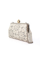 Sarah’s Bag clutch featuring a pomegranate design with crochet accents on a silver classic style.