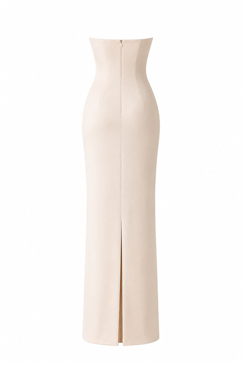 Nihan Peker vanilla poudre dress displayed on a mannequin, elegant gown with smooth fabric and subtle design details.