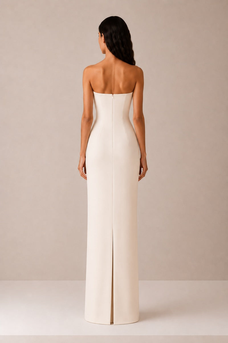 Nihan Peker vanilla poudre dress displayed on a hanger, showcasing its elegant, flowing gown design in soft fabric.