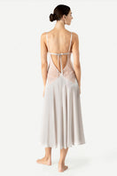 Back view of NK IMODE Precious Sunset long silk nightgown in elegant pearl gray with flowing fabric and delicate design.
