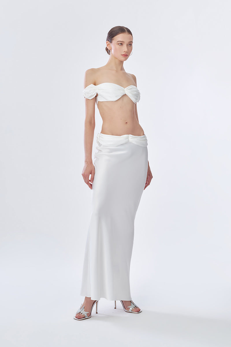 Off-white princess maxi skirt by Stolen Stores, flowing fabric and elegant design perfect for casual or formal wear.