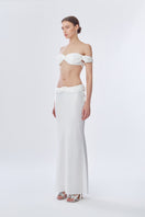 Off-white princess maxi skirt from Stolen Stores featuring a flowing, elegant design and lightweight fabric.