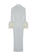White Junie Immy Maxi Dress displayed on a hanger, showcasing its flowing fabric and elegant design.