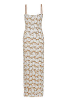 Nana Gotti Solana Maxi Dress in flowing fabric with a vibrant print, perfect for summer wear and elegant occasions.