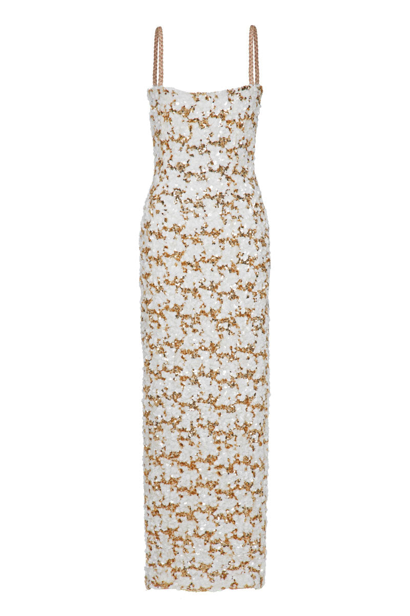 Nana Gotti Solana Maxi Dress in flowing fabric with a vibrant print, perfect for summer wear and elegant occasions.