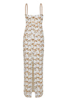 Nana Gotti Solana maxi dress with flowing fabric and floral pattern, perfect for summer occasions.