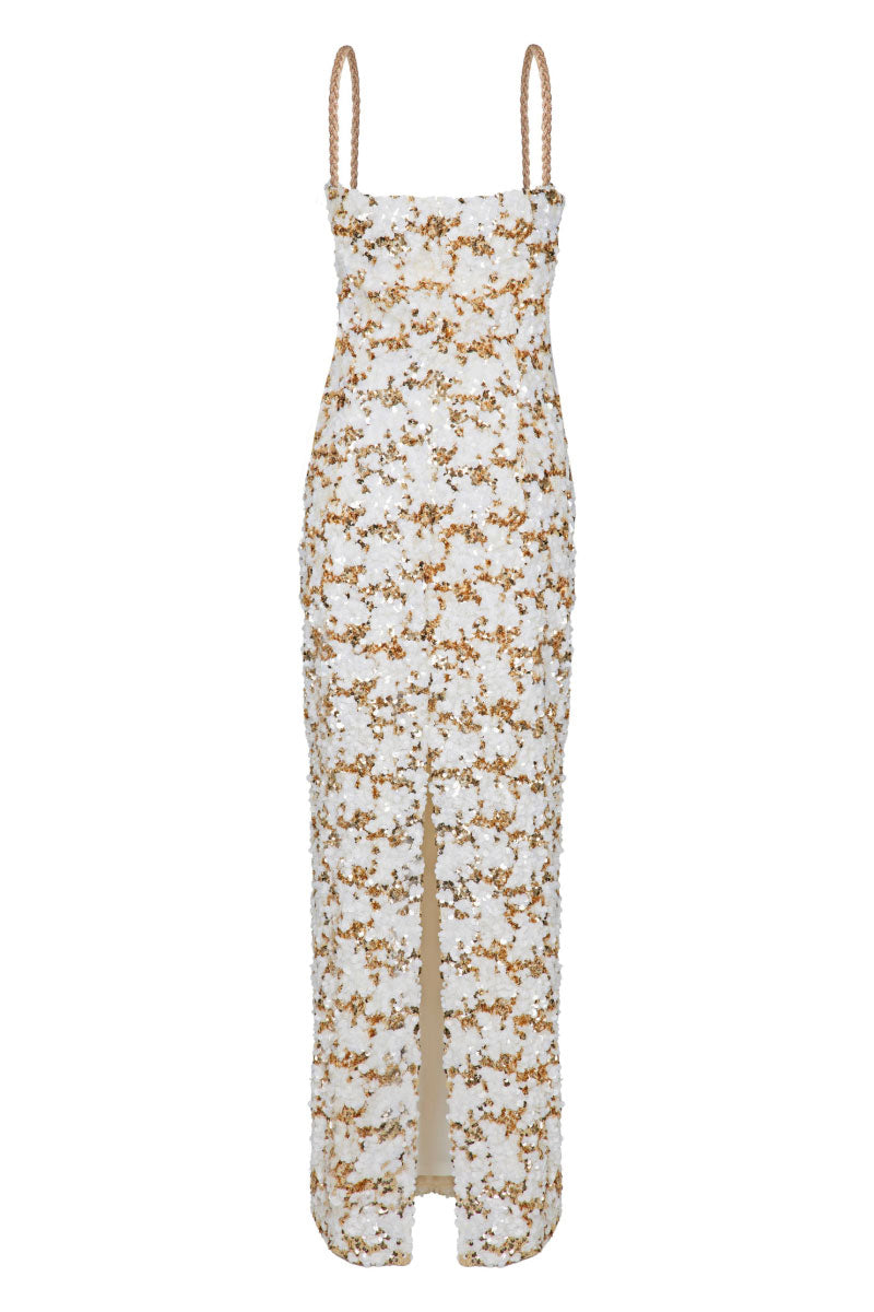 Nana Gotti Solana maxi dress with flowing fabric and floral pattern, perfect for summer occasions.