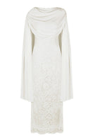 Nana Gotti Zafira midi dress featuring a flowing silhouette and elegant design, shown in a stylish, well-lit product image.