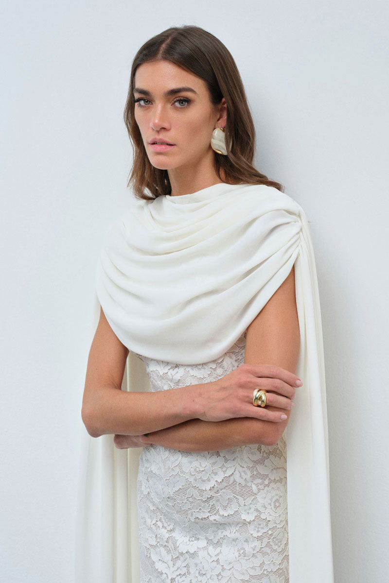 Nana Gotti Zafira midi dress displayed on a mannequin, featuring a flowy fabric and stylish design for elegant occasions.