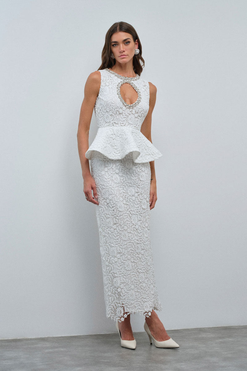 Nana Gotti KALINA Maxi Dress with flowing fabric and vibrant floral pattern, showcased on a model.