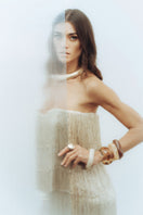 Nana Gotti HELIA Maxi Dress displayed on a hanger, featuring flowing fabric and elegant design for stylish summer wear.