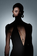 Nana Gotti Amalina gown, elegant evening dress with flowing fabric and intricate details, perfect for formal occasions.