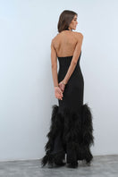 Nana Gotti Amalina gown with elegant flowing fabric and intricate details, perfect for formal occasions.