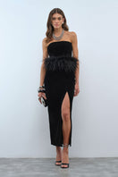 Nana Gotti Aurel midi dress in a stylish design, shown on a hanger against a white background.