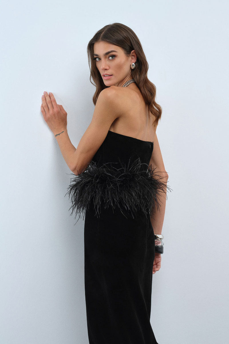Nana Gotti Aurel midi dress with flowing fabric and elegant design, displayed in a professional fashion photoshoot.
