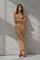 Nana Gotti LIA midi dress featuring a flowing fabric, sleeveless design, and elegant silhouette suitable for summer or special occasions.