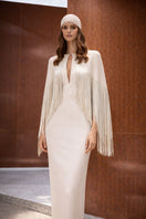 Nana Gotti Bianca Maxi Dress in flowy fabric with a fitted waist and elegant design, perfect for stylish summer occasions.