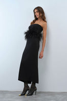 Nana Gotti VELA Maxi Dress with flowing fabric and elegant design, displayed on a mannequin.