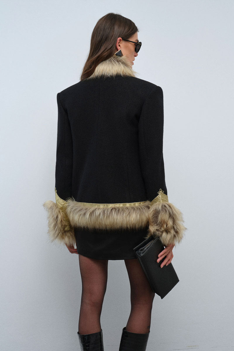 Nana Gotti Calla Blazer, stylish tailored jacket in neutral fabric, shown on a hanger with a clean background.