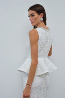 Nana Gotti KALINA Maxi Dress featuring flowing fabric and vibrant patterns, perfect for elegant summer occasions.
