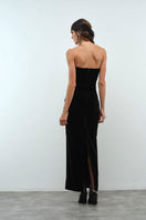 Nana Gotti Delara Maxi Dress shown in flowing fabric with a fitted waist and elegant design, perfect for summer occasions.