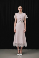 White Plan Prucel midi dress featuring a flowing silhouette and elegant design, perfect for stylish occasions.