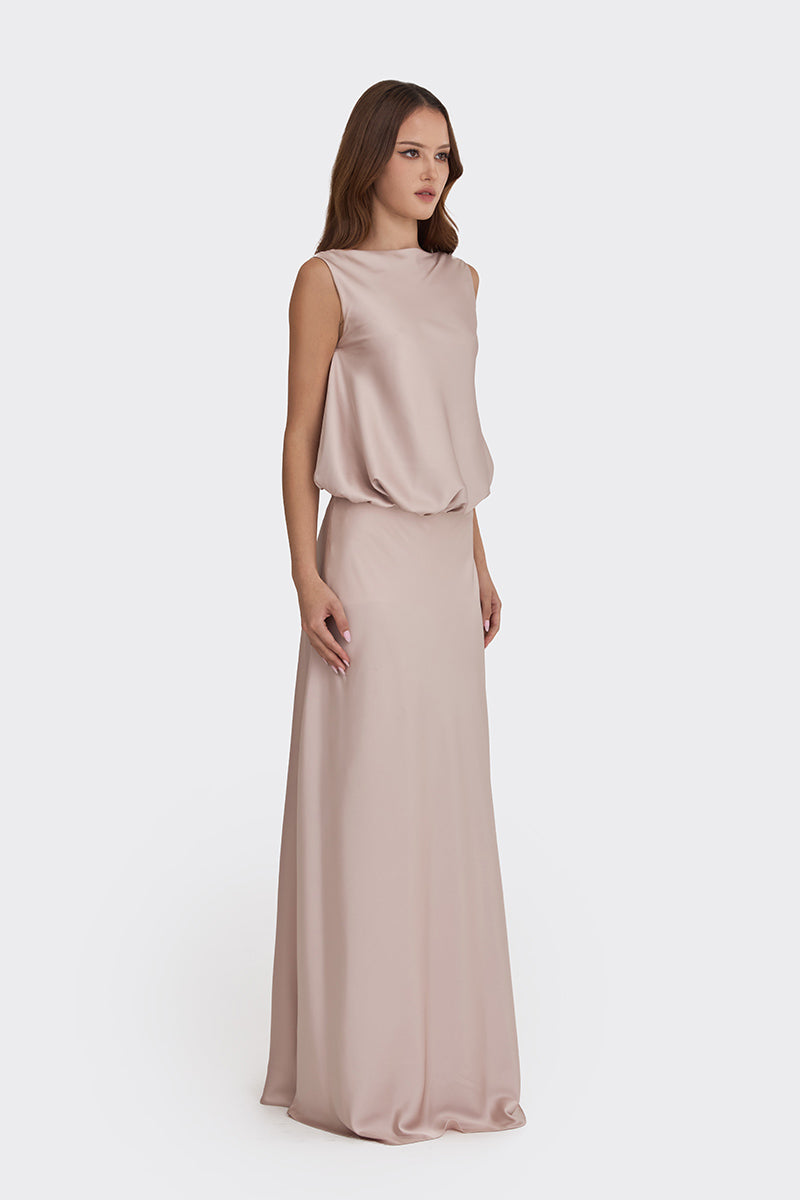 Silver pink puffed boatneck maxi gown from Stolen Stores, flowing fabric with elegant puffed sleeves and a fitted waist.