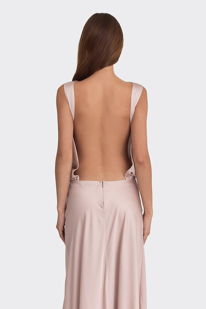 Silver pink puffed boatneck maxi gown from Stolen Stores, flowing fabric with elegant puffed sleeves and a fitted waist.