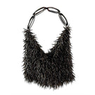 Millanne Tale punk silver top handle bag with sleek design, shown against a white background.