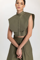 Olive drab midi skirt by ANA + MARIA featuring a flowy design and subtle pleats, perfect for casual or dressed-up looks.