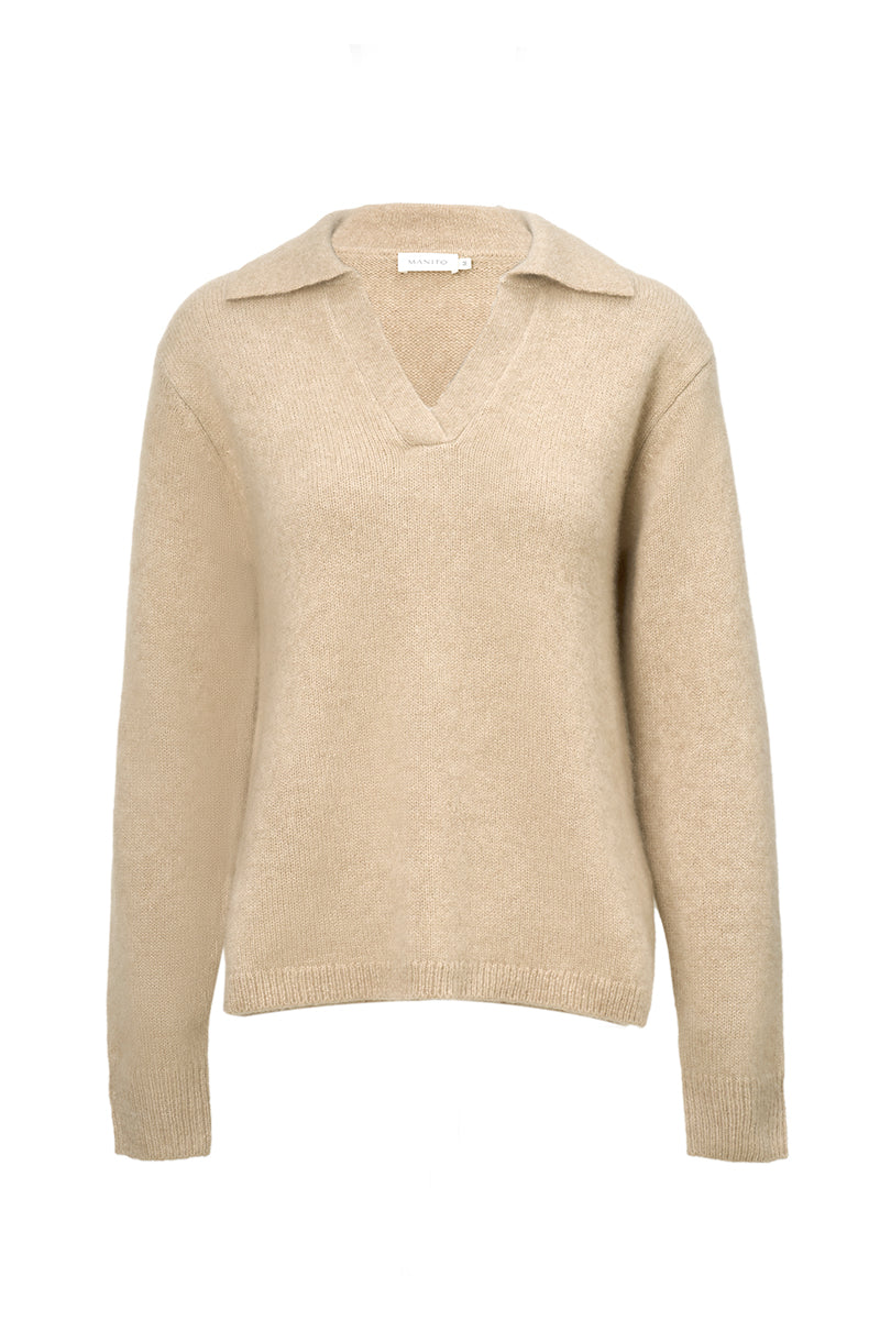 Manito Purity women's beige polo knit top, a stylish sweater with a classic collar and textured knit fabric.