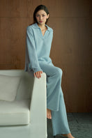 Blue Purity women's polo knit sweater by MANITO, featuring a classic fit and ribbed collar, perfect for casual wear.