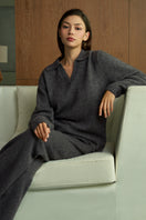Manito Purity women's straight-leg knit pants in gray, shown laid flat with waistband and full length visible.