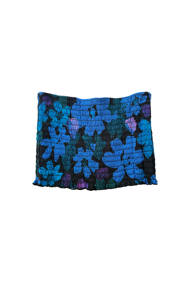 Blue printed mini skirt with shirred details from Chictopia, featuring a fitted waist and playful pattern.