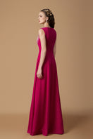 Dark pink crepe de chine A-line gown by I.H.F, featuring a flowing silhouette and elegant design, showcased on a model.