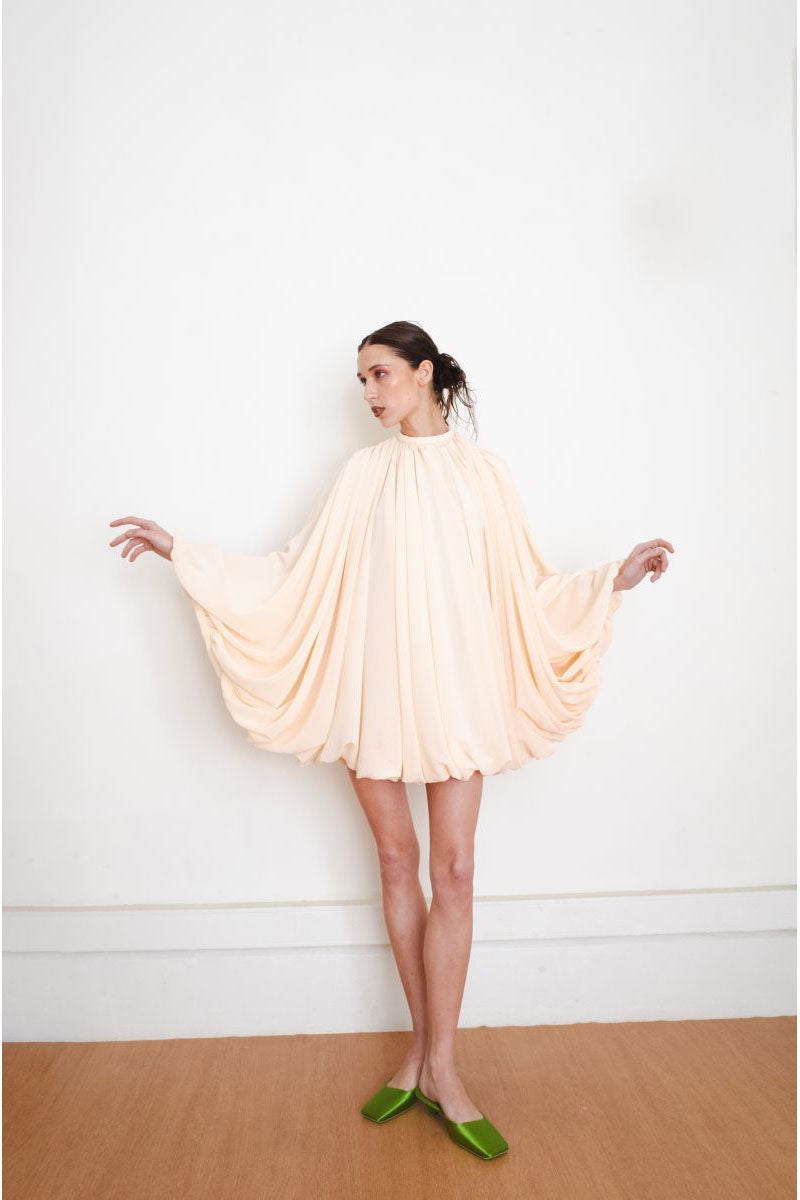 YASSMIN SALEH Quietude Ivory mini dress displayed from the front view, featuring a fitted silhouette and elegant design.